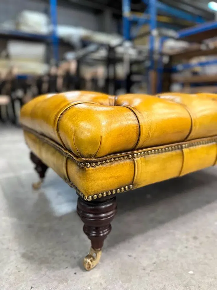 Mustard-tan buttoned leather footstool after recolour and conditioning